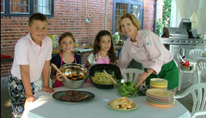 Photo of Dame Carla Snyder with Jr. Chefs